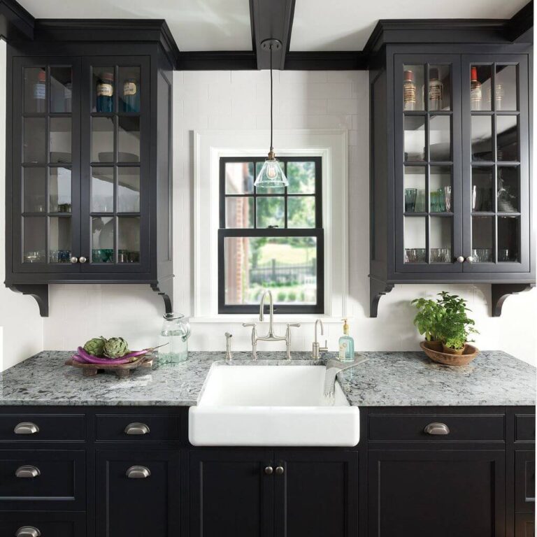 espreso colored traditional stlye kitchen cabinet with grey granite countertops