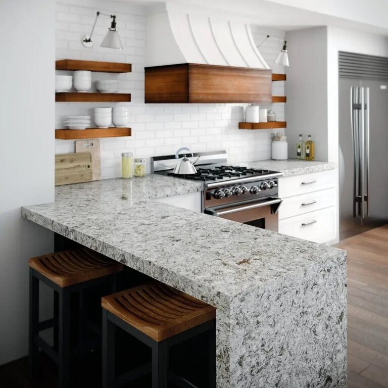 stone surface kitchen island with waterfall edge