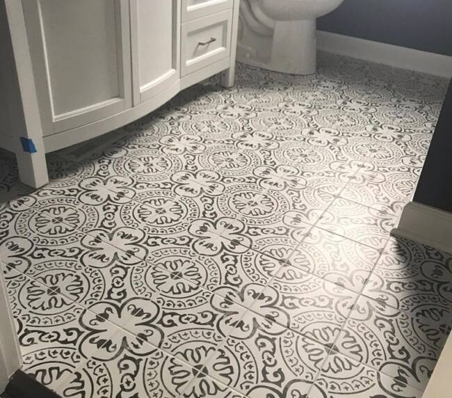 bathroom design featuring intricate patterned tiles