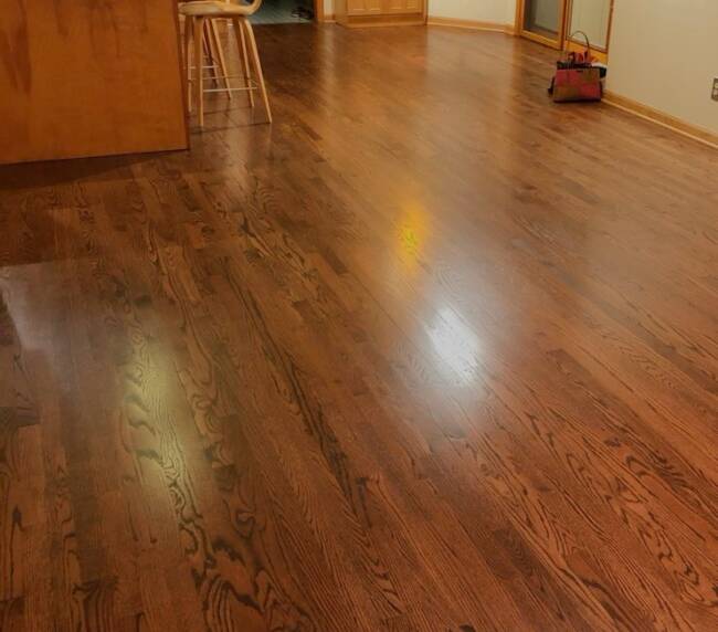 kitchen with dark hardwood flooring